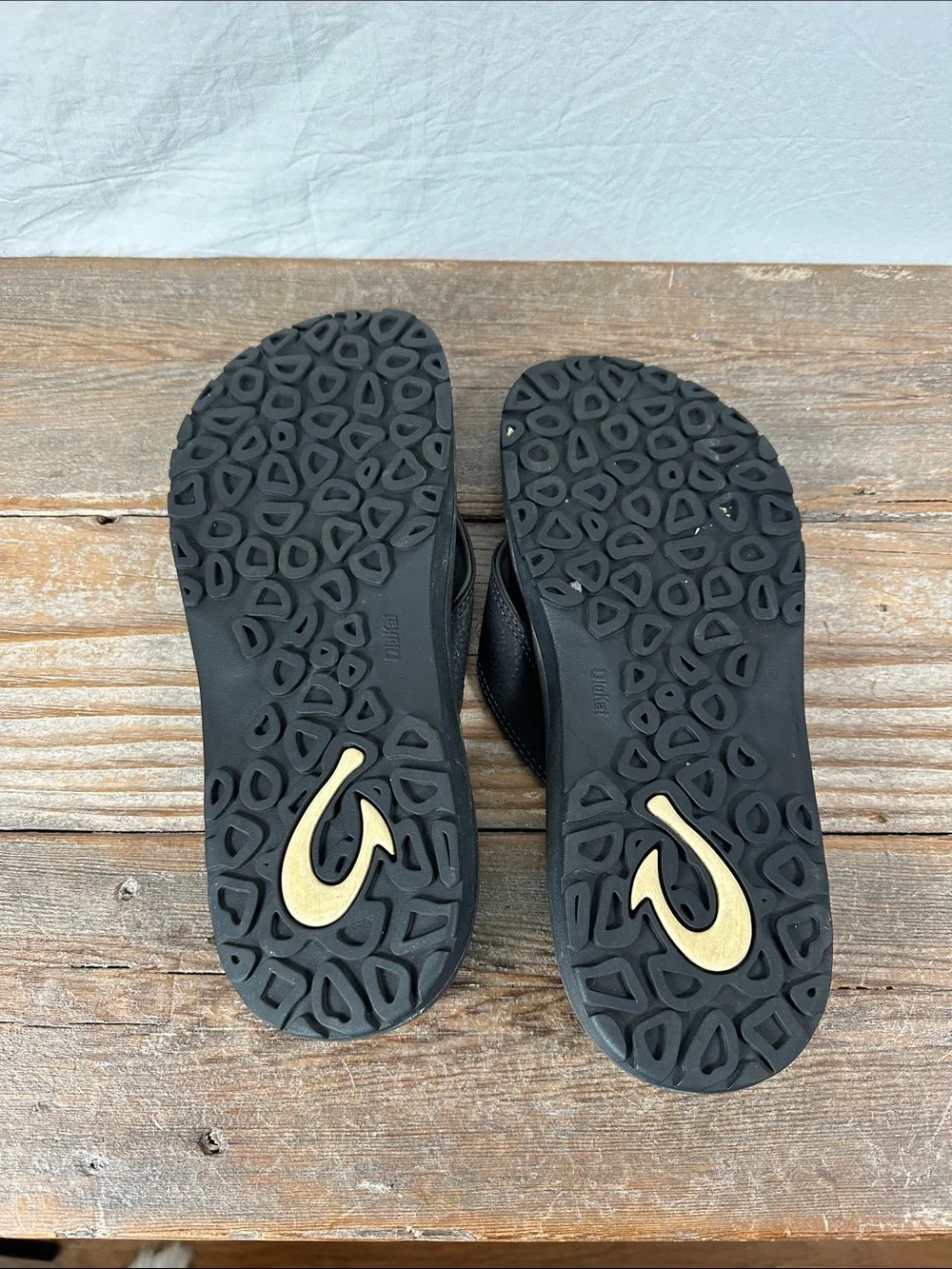 OluKai Men's Black Flip-Flop Sandals